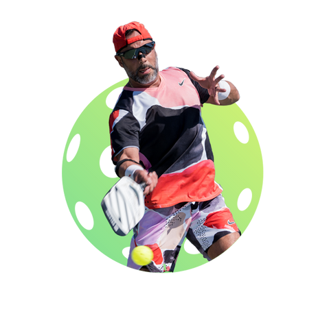 Man wearing red hat and sunglasses hits a forehand while improving his UTR Pickleball Rating at. UTR Sports pickleball tournament